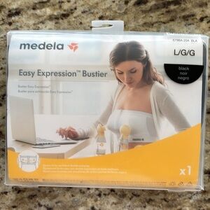 Medela easy expression, bustier labeled a size large color is black. B…